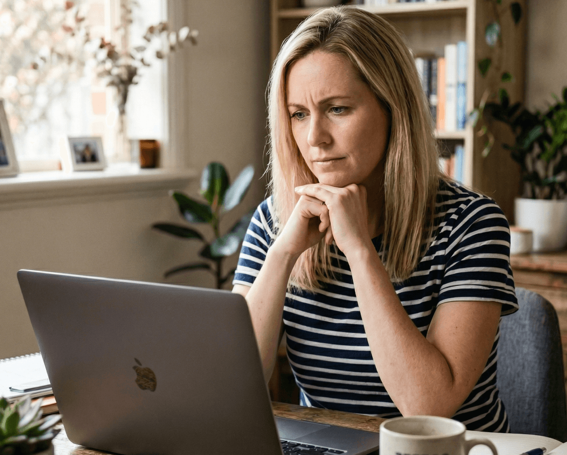 Person reviewing their tax return on a laptop
